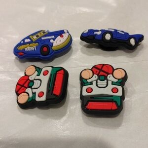 4 PCS of figurine shoe charms New.